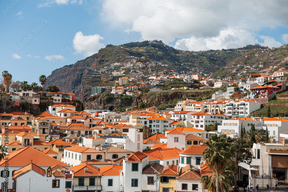 Amazing Mountains and beautiful houses with orange roofs on the island of Madeira