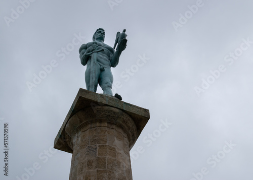 Victor statue at Belgrade park Kalemegdan close up against overcast sky