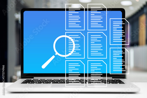 The concept of checking documents. Graphics with document icons on laptop background.