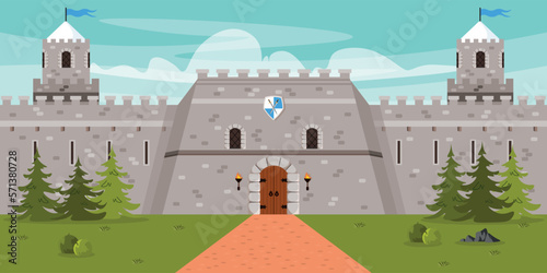 Vector illustration of a beautiful knight's castle. Cartoon ancient stone castle with towers, gates and flags, coat of arms, Christmas trees, grass and road. Military defensive fort.