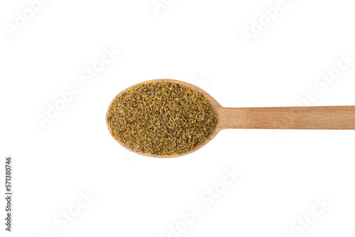 dried common chamomile flowers in latin - Matricaria chamomilla  on wooden spoon isolated on white background. Medicinal herb.