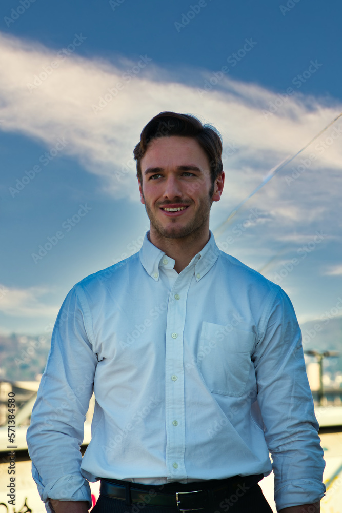 Fototapeta premium One handsome elegant young man in urban setting