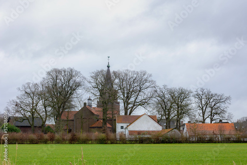 Traditional countryside houses under cloudy sky in winter, Meerlo is a small town village in the Dutch province of Limburg, Holland, Located in the municipality of Horst aan de Maas, Netherlands.