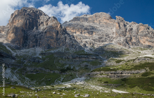 Sunny summer landscape with monumental rocks in the Brenta Dolomites, Italy