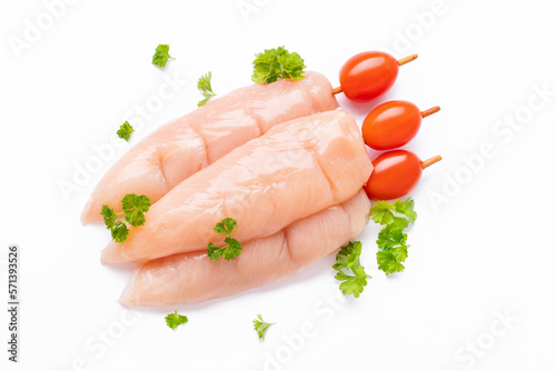 Skewers raw meat and vegetables.Top view.Raw chicken inner on skewers with tomatoes white background with spices, herbs.Raw uncooked Chicken meat,kebab on skewers.Chicken Skewers breast fillet meat.