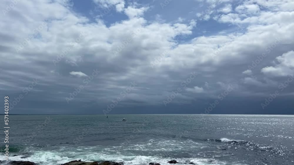 Landscape view blue sea with waves crashing on shore beautiful clouds, shining in daytimeMy Movie Landscape view blue sea with waves crashing on shore beautiful clouds, shining in daytimeMy Movie