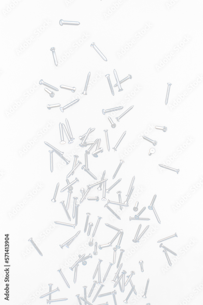 Screwdriver Nail fly floating in mid air. Many group screw nails short long metal fall as construction tools. Black background isolated. New Screwdriver Nail fall down unbox steel hardware work Screwdriver Nail fly floating in mid air. Many group screw nails short long metal fall as construction tools. Black background isolated. New Screwdriver Nail fall down unbox steel hardware work