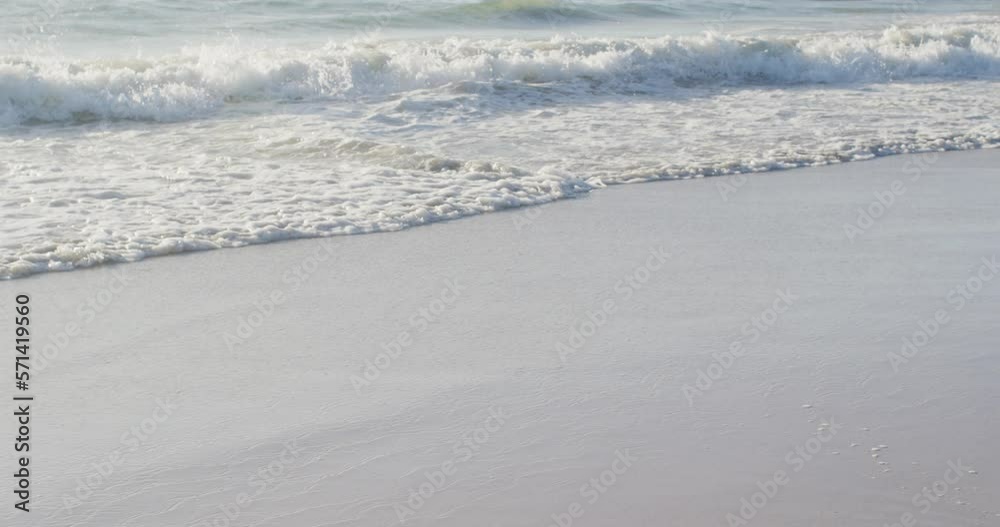 Video of calm sea waves and sand beach Video of calm sea waves and sand beach