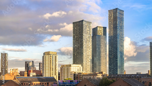 city skyline at sunset with three bulidings in Manchester
