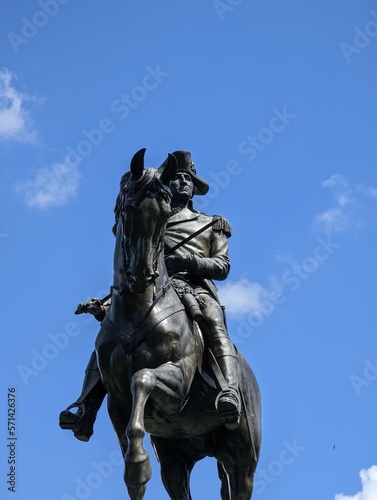 statue of george washington with a horse  american people  blue sky  boston city common park