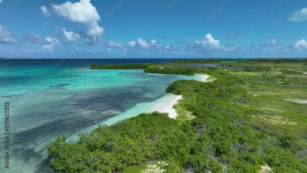 Aerial moving view of coastline of Crasky also known as Crasqui island in Los Roques Archipelago. Venezuela. Aerial moving view of coastline of Crasky also known as Crasqui island in Los Roques Archipelago. Venezuela.