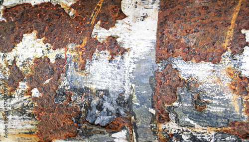 Rusted metal panel with peeling paint grunge texture