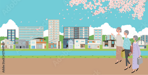 家族で河川敷を散歩　春　桜　シニア女性買い物帰りのお散歩