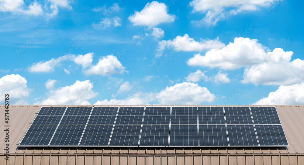 Solar cell panel on roof with blue sky and cloud background Solar cell panel on roof with blue sky and cloud background