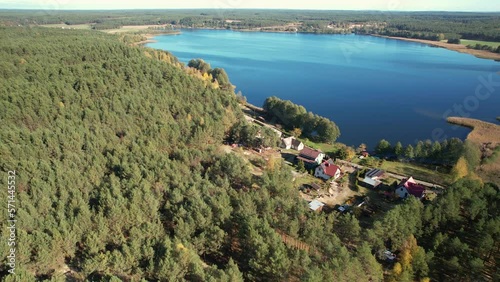 Jezioro Witoczno Lake With Coastal Dense Forest Near Swornegacie Village In Poland. Aerial Drone Shot
 photo