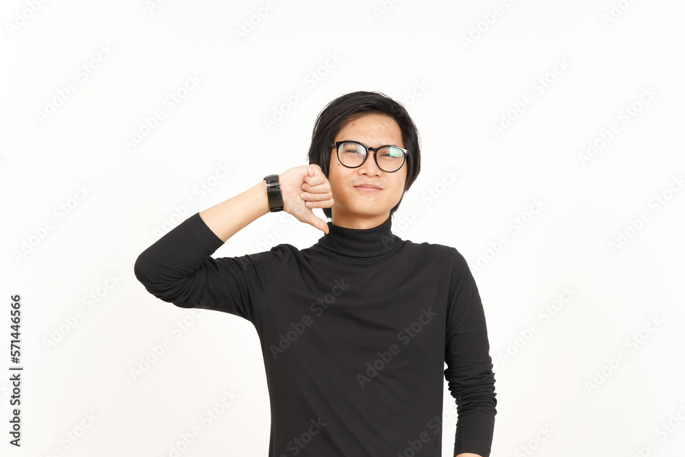 Showing Thumbs Down Of Handsome Asian Man Isolated On White Background Showing Thumbs Down Of Handsome Asian Man Isolated On White Background