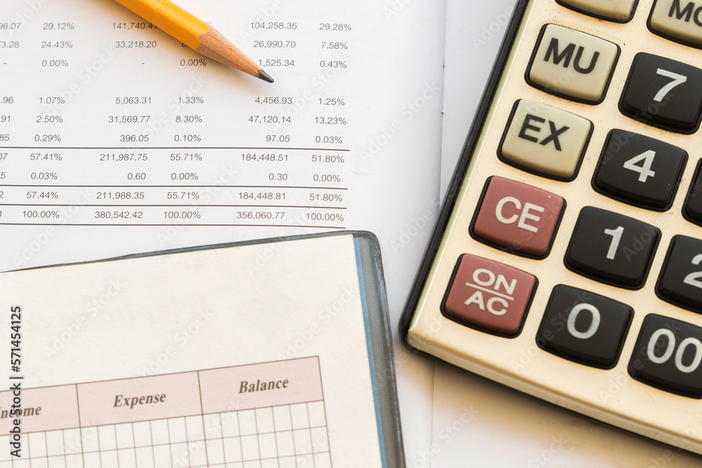 calculator, statement balance sheet accounting for business work arrangement flat lay style on background white calculator, statement balance sheet accounting for business work arrangement flat lay style on background white