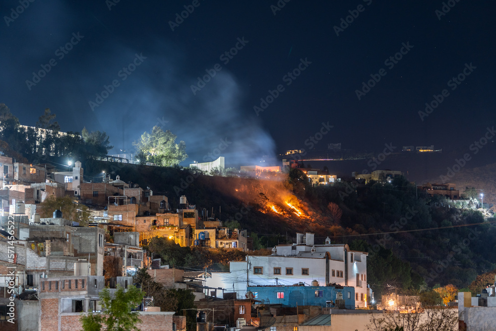 Obraz premium View of a burning slope in the city of Guanajuato at night, Mexico.