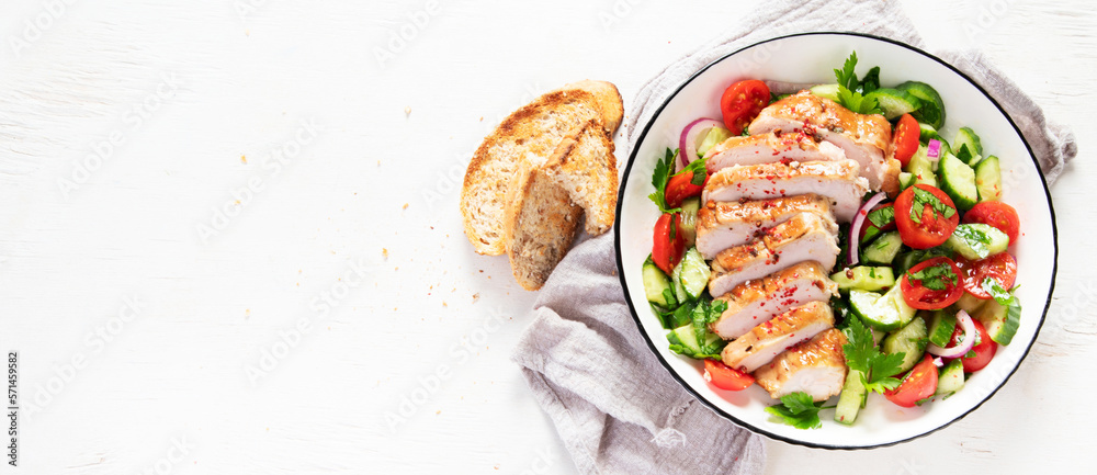 Salad with chicken meat. Fresh vegetable salad with chicken breast. Meat salad with chicken fillet and fresh vegetables on plate. Salad with chicken meat. Fresh vegetable salad with chicken breast. Meat salad with chicken fillet and fresh vegetables on plate.