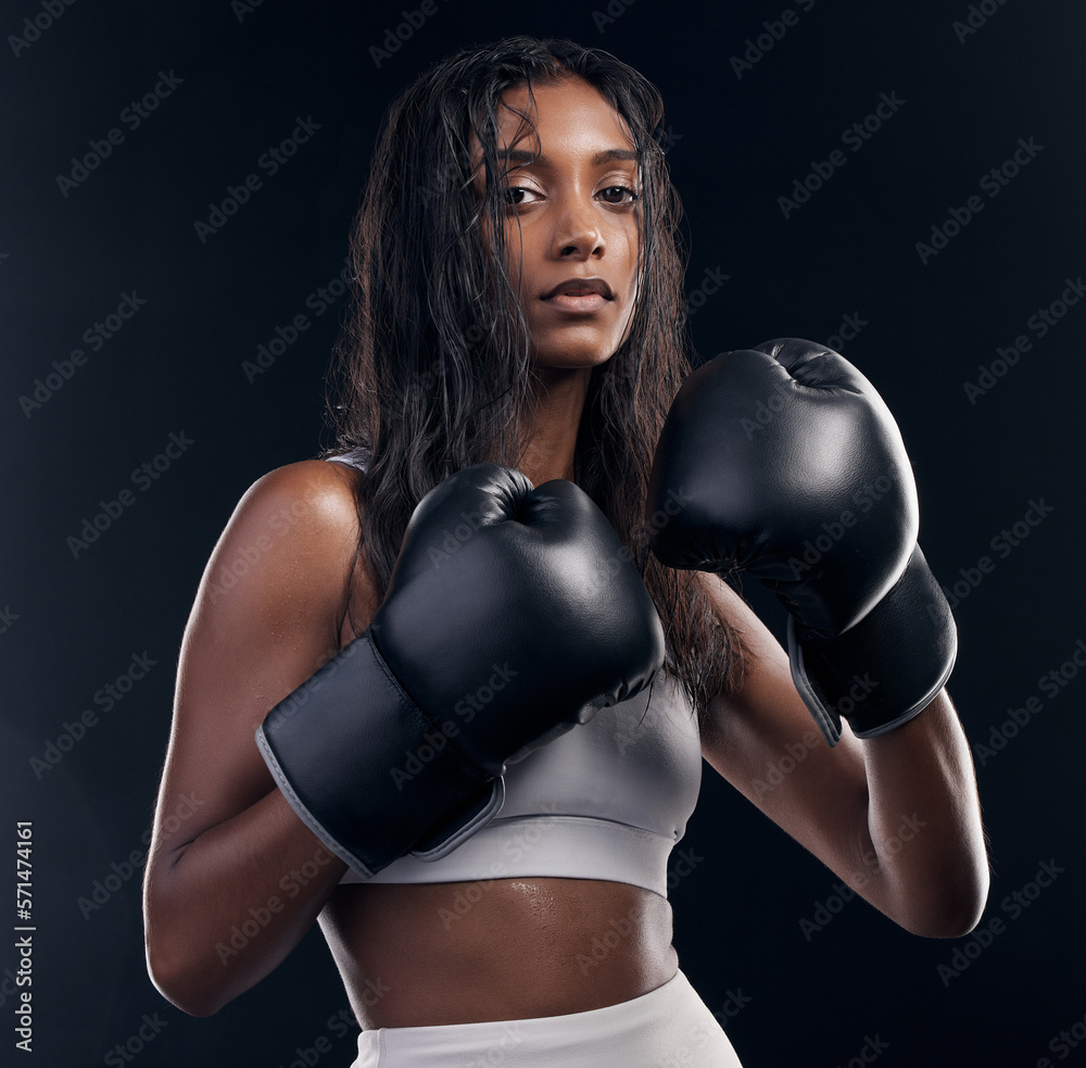 Boxer, fight and portrait of woman on black background for sports, strong focus or mma training. Female boxing, workout or fist gloves of impact, energy and warrior power for studio fitness challenge