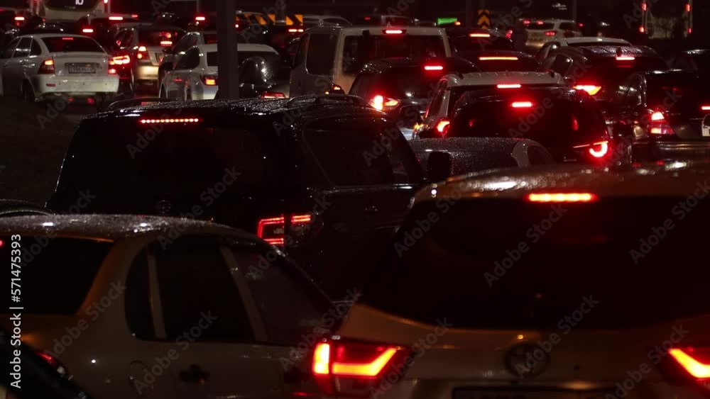 October 19, 2022 Astana, Kazakhstan: Evening car traffic in a big city. Cars in motion and standing in traffic jams. October 19, 2022 Astana, Kazakhstan: Evening car traffic in a big city. Cars in motion and standing in traffic jams.