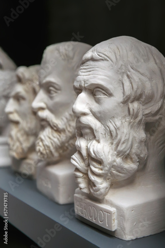Plaster bust of Herodotus, greek historian and so-called 'father of history' in group of other busts. Portraits of ancient historical persons. Typical souvenir in Turkey. Copy space, selected focus photo