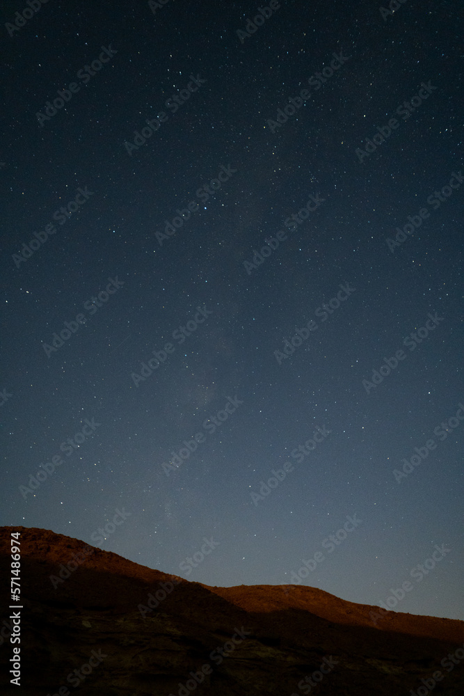 Naklejka premium Starry sky in the Hurghada desert, with a mountain