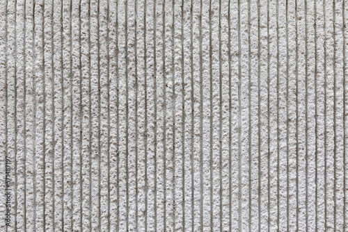 Surface of the wall with a decorative white cement.