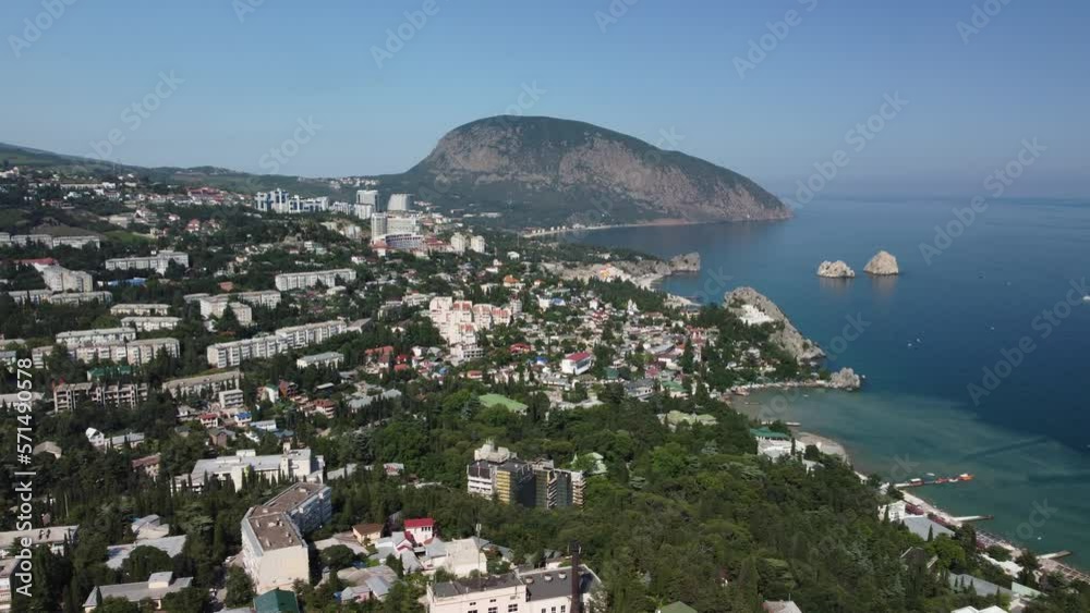GURZUF, CRIMEA - Aerial Panoramic view on Gurzuf bay with Bear mountain Ayu-Dag and rocks Adalary, Artek - oldest children vacation camp. Yalta region, the South coast of Crimea peninsula GURZUF, CRIMEA - Aerial Panoramic view on Gurzuf bay with Bear mountain Ayu-Dag and rocks Adalary, Artek - oldest children vacation camp. Yalta region, the South coast of Crimea peninsula