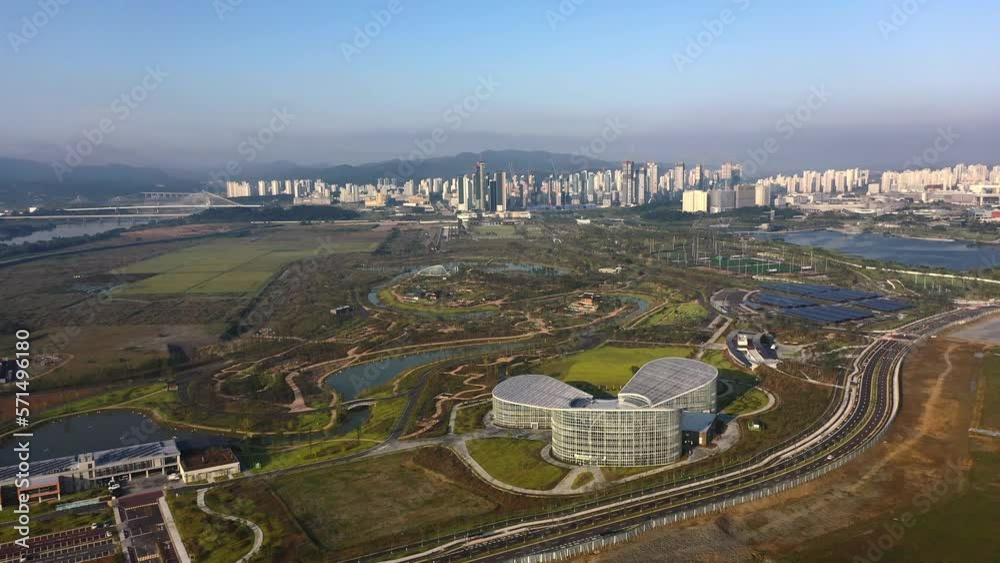 A view of Sejong City behind the Sejong National Arboretum in Sejong City, Korea A view of Sejong City behind the Sejong National Arboretum in Sejong City, Korea