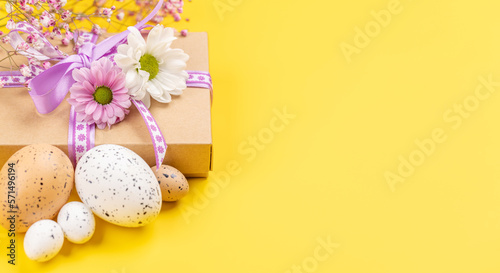 Gift box  Easter eggs and flowers