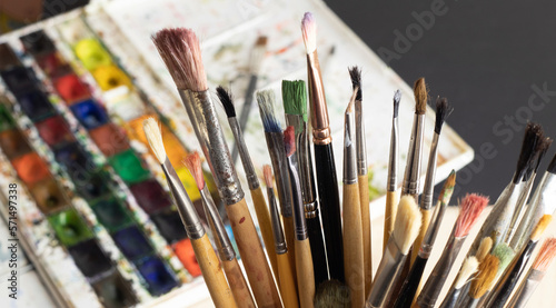 Artist's set of different brushes for painting with paints.