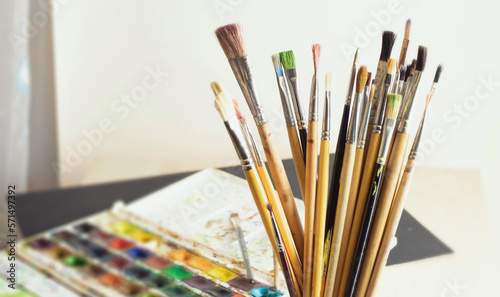 Artist's set of different brushes for painting with paints.