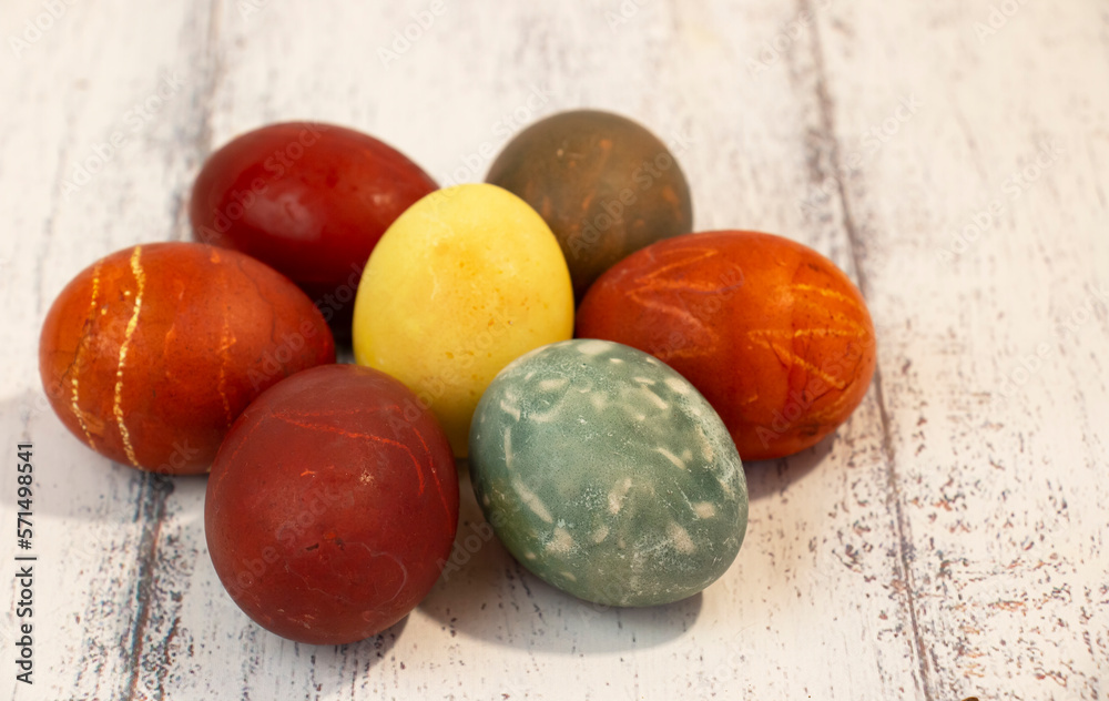 Painted colorful Easter eggs on the table. Simal of Easter