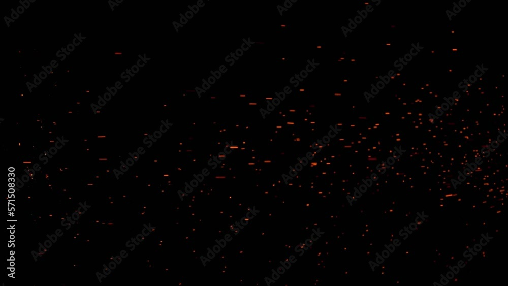 Burning red hot sparks rise from large fire in the night sky