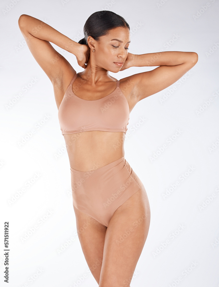 Fototapeta premium Body, underwear and beauty black woman isolated on a white background for skincare, cosmetics and aesthetic. Young lingerie model or person in studio mockup for dermatology or hair removal results