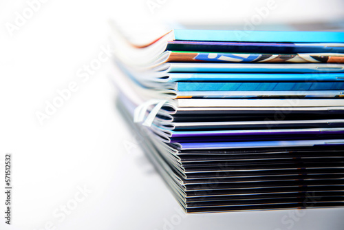 stack of magazines on white background © nirats