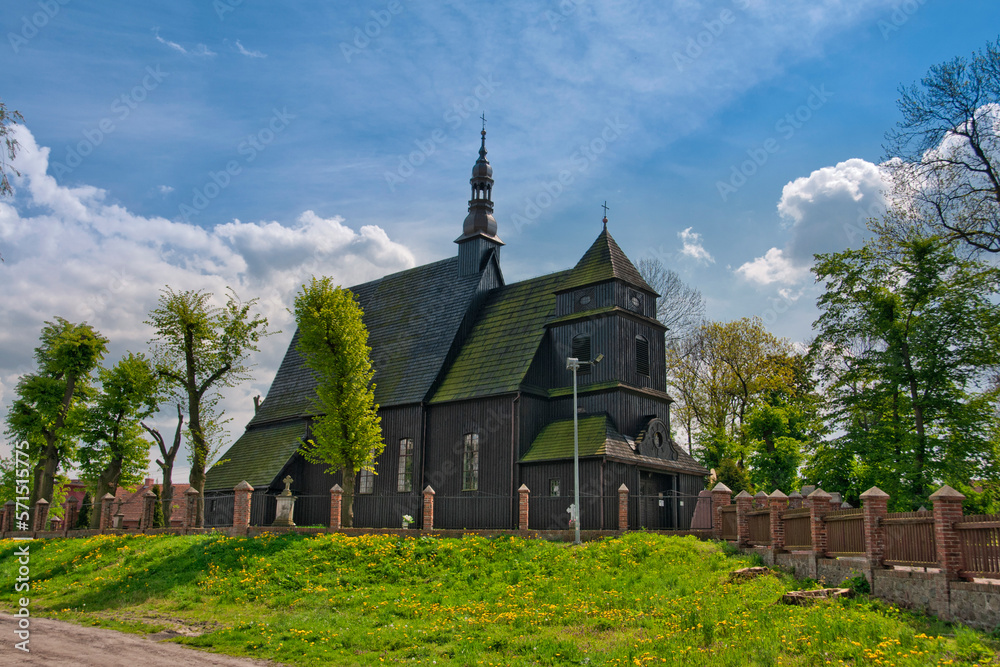 Wooden Church of St. Michael the Archangel and St. Mary Magdalene in Domachowo, village in Greater Poland voivodeship. Poland Wooden Church of St. Michael the Archangel and St. Mary Magdalene in Domachowo, village in Greater Poland voivodeship. Poland