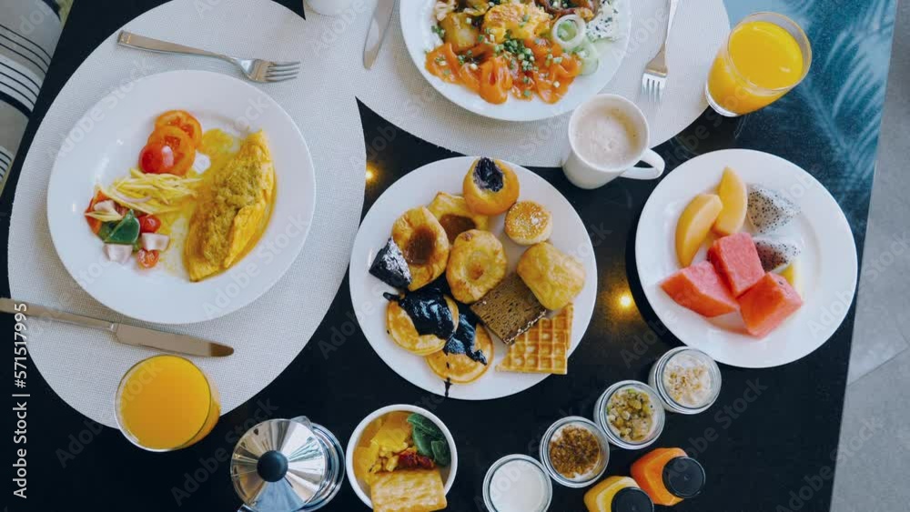 Hotel breakfast buffet with variety of food. Top view of tropical breakfast