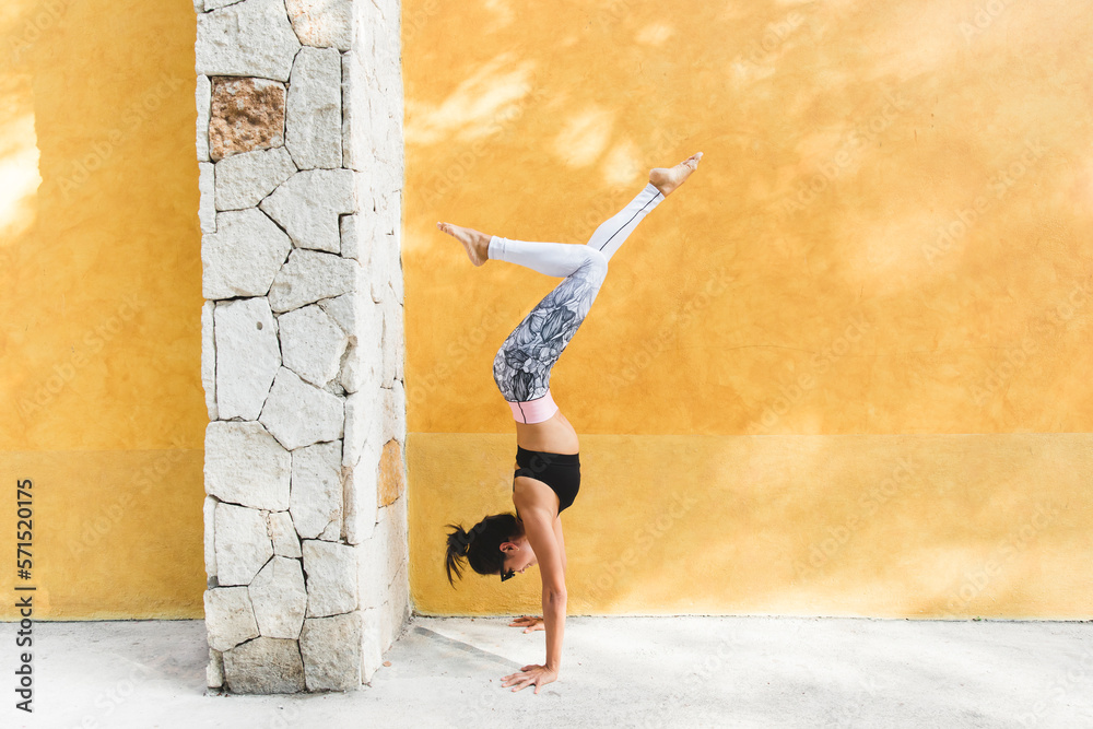 Woman practicing yoga in Mexico