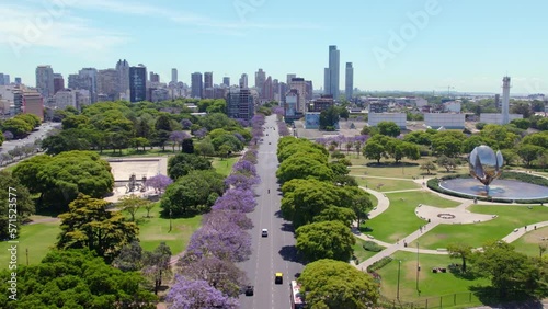 Aerial View Of Traffic In The Road Along The United Nations Park With Floralis Generica Sculpture In Buenos Aires, Argentina. photo
