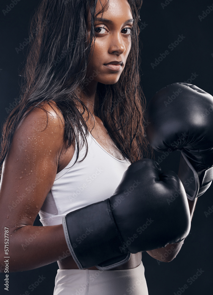 Foto Stock Boxer champion, woman and portrait on black background for  sports, strong focus or mma training. Female boxing, gloves and fist fight  in studio, impact and warrior energy for power of