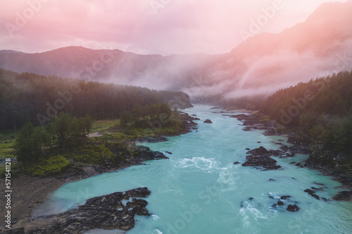 Evening landscape Altai mountains summer Russia  aerial top view. Blue Katun river with fog