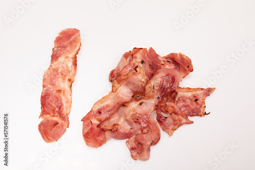 It is a processed meat made from the belly or flank of pork.