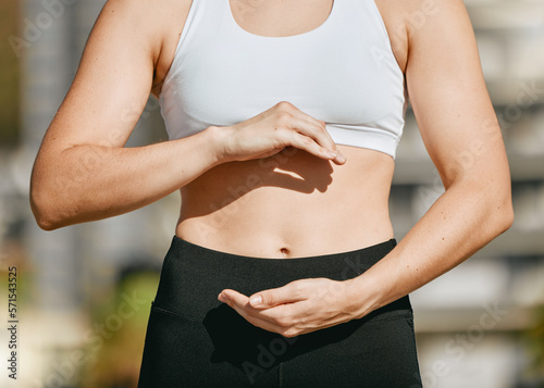 Hands frame, fitness and stomach for diet wellness, body health or abs muscle growth in workout, training or exercise. Weight loss, sports and woman with liposuction, tummy tuck or gut digestion. photo