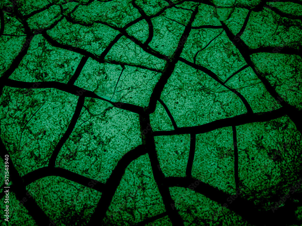 Cracked dry ground texture. Cracked ground texture with spooky Halloween cinematic Stock Photo