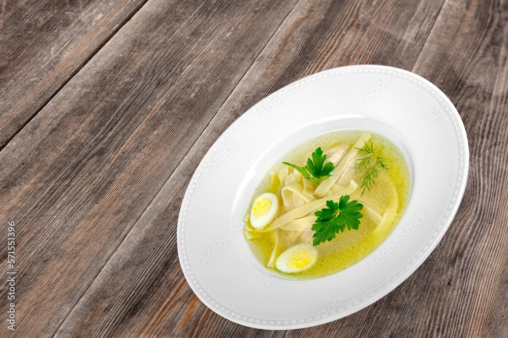 Delicious hot soup dish in plate Delicious hot soup dish in plate