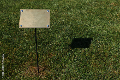 Golden plaques for writing on the territory of the park photo