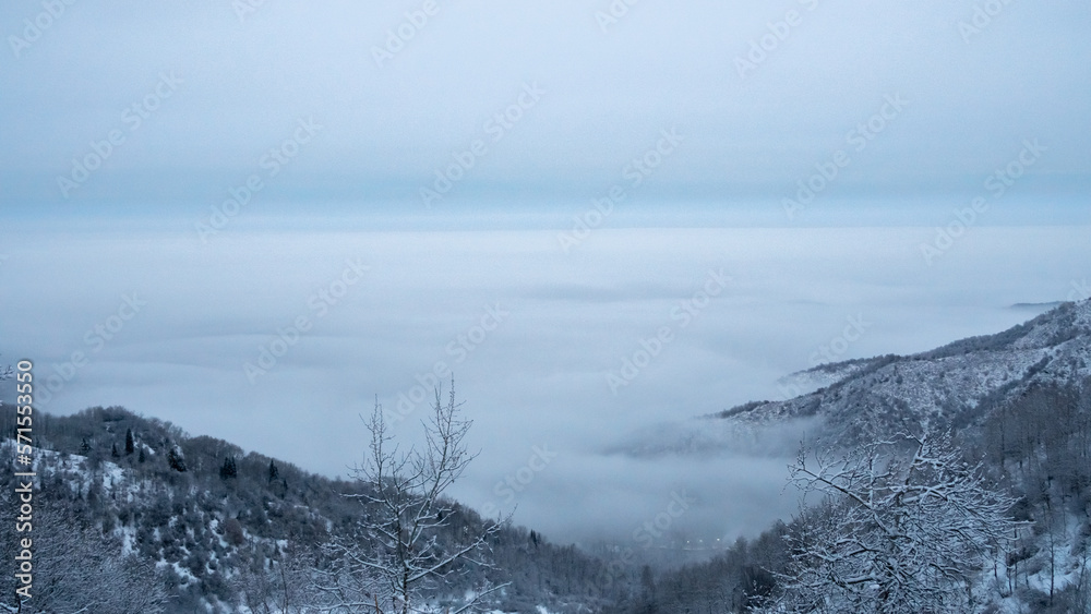 low clouds in the mountains. mountains are higher than clouds