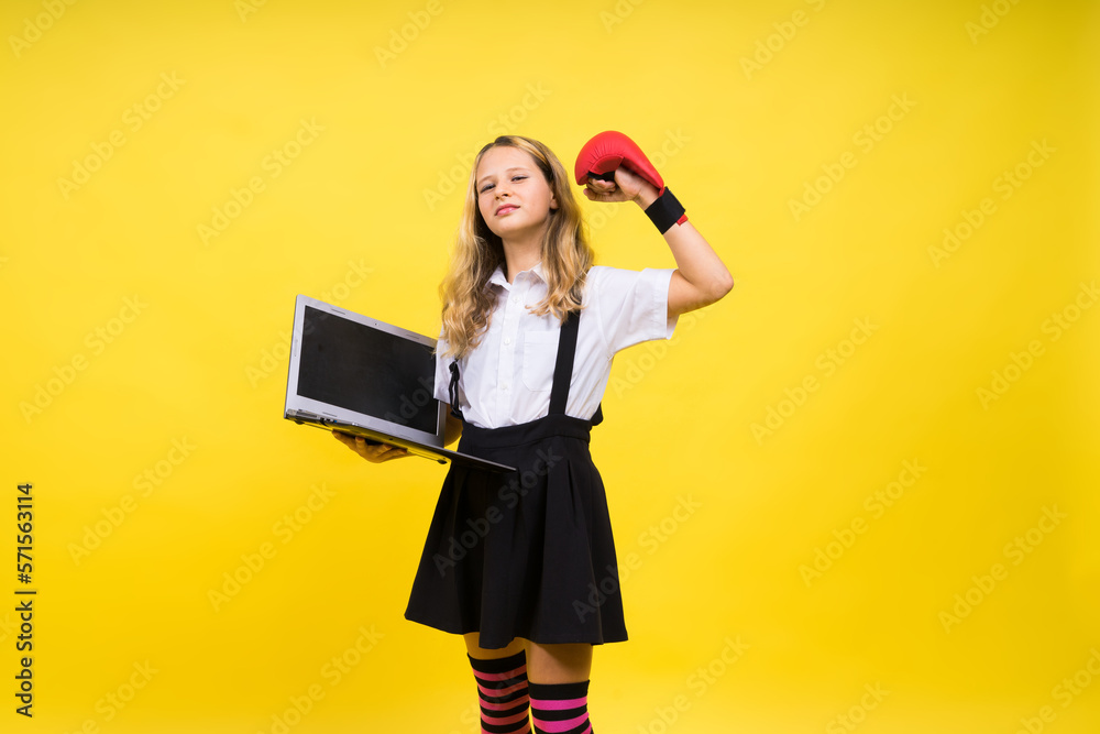 Little happy blonde kid girl 12-13 years laptop pc computer. Children lifestyle childhood concept. Little happy blonde kid girl 12-13 years laptop pc computer. Children lifestyle childhood concept.